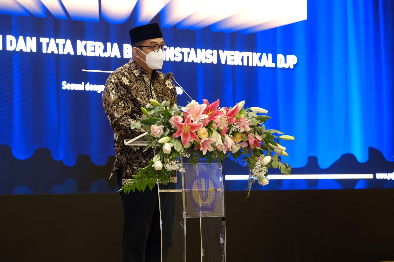 Dirjen Pajak Suryo Utomo menyampaikan laporan terkait penataan organisasi dan tata kerja baru instansi vertikal DJP