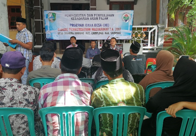 Pelaksanaan sosialisasi perpajakan di desa Dharma Tanjung