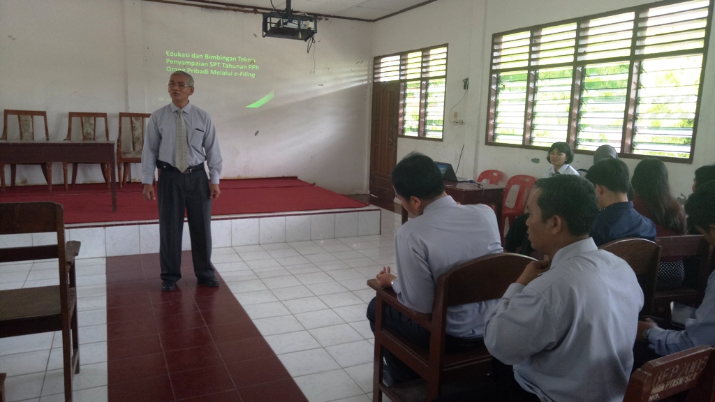 sambutan oleh Lektor STIE Surya Nusantara