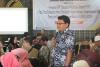 Staf KP2KP Sumenep, Andika sedang memberi petunjuk pengisian SPT Tahunan 1771