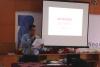 Aris, Kepala Kantor membaca kisah inspirasi saat morning activity
