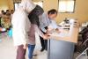 Pendaftaran peserta sosialisasi di Aula Kecamatan Tenggarong Seberang.