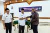 Penyerahan piagam MoU Konfirmasi Status Wajib Pajak.