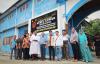 Berfoto bersama di pintu masuk Pondok Pesantren Nurul Anwar, Sentani, Jayapura