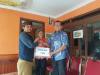 Pemberian bantuan dari KPP Pratama Sukabumi kepada pihak Desa Sirnaresmi