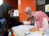 Kawan Pajak Memberikan Penjelasan Kepada Salah Satu Wajib Pajak